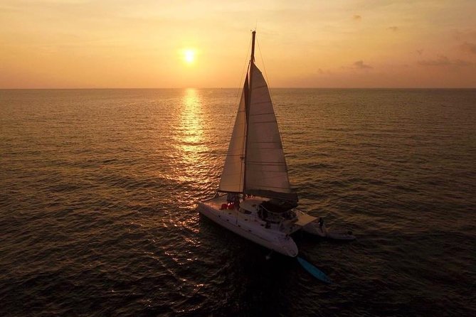 Phuket Catamaran Cruise: Coral Island with Dinner and Sunset by Bangtao Beach Bar Phuket Catamaran Cruise: Coral Island with Dinner and Sunset - Promthep Cape