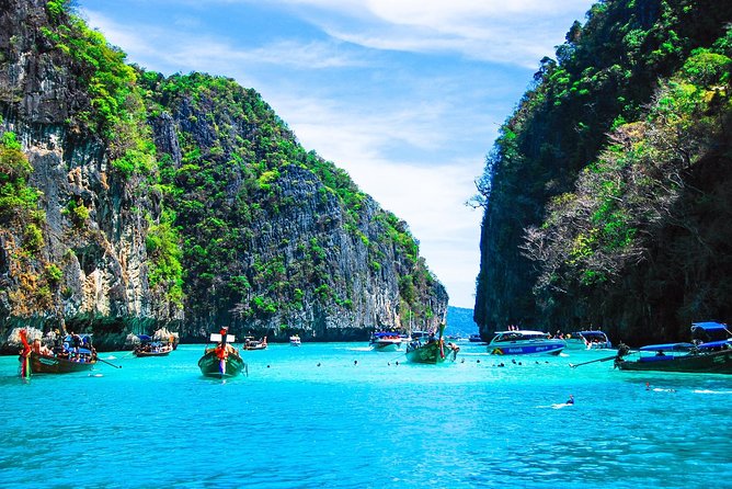 Phuket to Phi Phi & Rang Yai Islands: Private Speedboat Tour by Bangtao Beach Bar Phuket to Phi Phi & Rang Yai Islands: Private Speedboat Tour by Bangtao Beach Bar